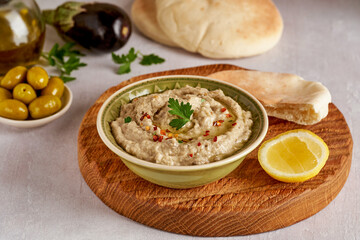Eggplant Aubergine dip Baba Ghanoush. Traditional vegan arabic appetizer mutabbal . Close up