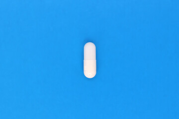 Tablet on a yellow background, a medical concept for background and text