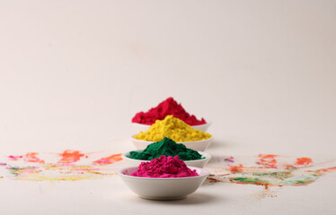 Holi greetings - Organic Gulal  in bowl for festival of colors