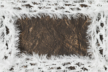 Knitted fabric with fringe on a decorative background