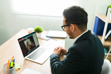 Happy business colleagues during an online meeting