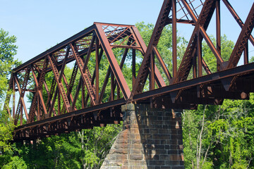 Stone pier and iron superstructure of railroad bridge in Middletown.