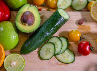 Healthy food clean eating selection: fruit, vegetable, seeds, superfood, leaf vegetable and mediterranean dishes. Detox and clean diet. Foods high in vitamins, minerals and antioxidants.