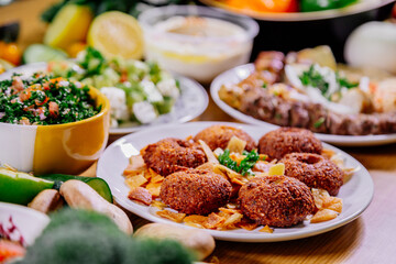 Healthy food clean eating selection: fruit, vegetable, seeds, superfood, leaf vegetable and mediterranean dishes. Detox and clean diet. Foods high in vitamins, minerals and antioxidants.
