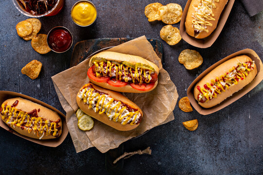 Variety of hot dogs with ketchup and mustard