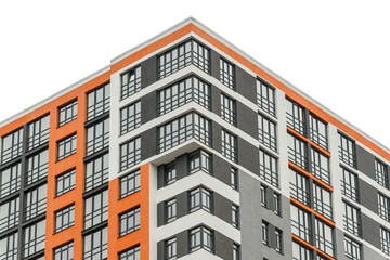 The facade of a multi-storey building with windows and balconies as an element of the architecture of a modern city