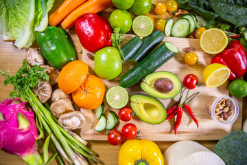 Healthy food clean eating selection: fruit, vegetable, seeds, superfood, leaf vegetable and mediterranean dishes. Detox and clean diet. Foods high in vitamins, minerals and antioxidants.