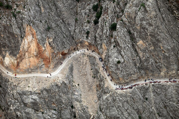 People watching the Dark Canyon view on the rock in Kemaliye (Egin), Erzincan, Turkey.