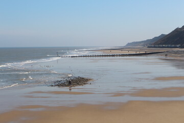 Cromer, Nortfolk, coast from the top, winter, seaside gentle waves crashing on the shore, north sea, seascape, northern Europe, beautiful Englad 