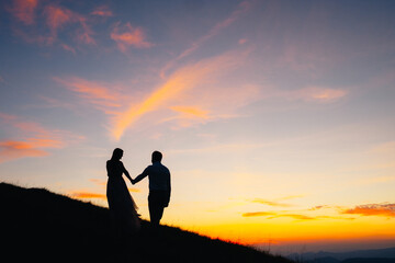 loving couple on a sunset background