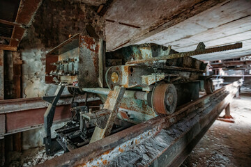 Fototapeta na wymiar Old rusty trolley in abandoned factory