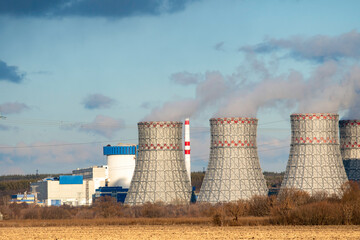 Cooling tower of Atomic power station with nuclear reactor. Industrial zone with Nuclear power...