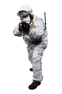 Male in soldier (snow camouflage) uniform with weapon. Shot in studio. Isolated with clipping path on white background