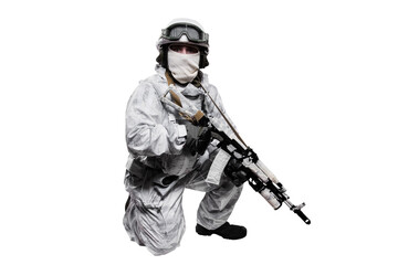 Male in soldier (snow camouflage) uniform with weapon. Shot in studio. Isolated with clipping path on white background