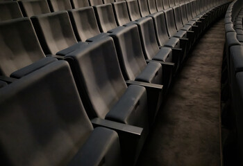 Empty dark gray seats in the theatre at lockdown