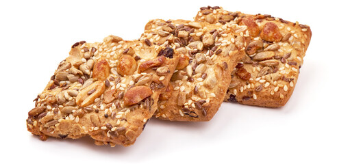 Cookies with nuts and seeds of peanut, sunflower seeds, sesame, linen, organic food, isolated on white background