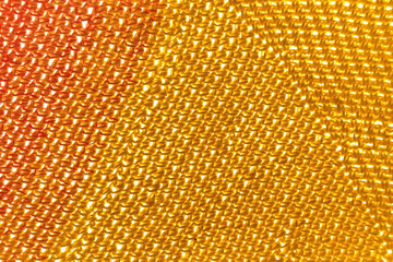 Naklejka premium Handmade multi colored knitted background.