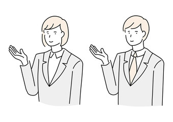 案内をするスーツを着た男女