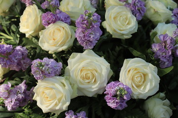 White and purple wedding centerpiece