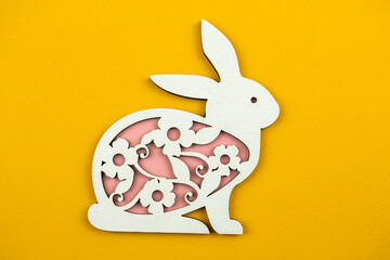 Wooden easter decoration, flat bunny background