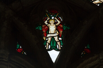 Fototapeta na wymiar Detail of an old stined glass window