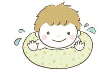 浮き輪をつけて水遊びする男の子