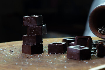 tower of salted chocolate bonbons keeping balance