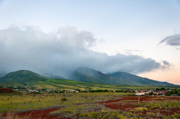 Fog and clouds rolling over Pu'u Kukui mountain, Maui, Hawaii
