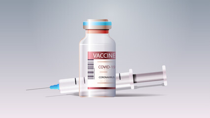 syringe and bottle vial of covid-19 vaccine injection vaccination immunization anti coronavirus disease