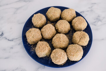 vegan arancini risotto balls about to get fried, healthy plant-based food