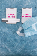 shop in store with mask vs shop online with progress bar icon, competition and retail industry