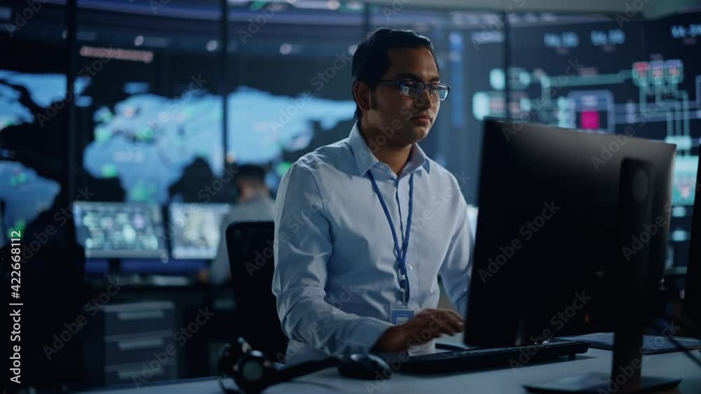 Poster Professional IT Technical Support Specialist and Software Developer Working on Computer in Monitoring Control Room with Digital Screens with Server Data, Blockchain Network and Surveillance Maps. 