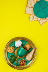 Composition with matzo bread, kippah and seder plate. Passover Jewish holiday.