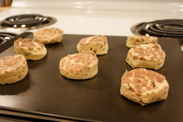Delicious uncooked cinnamon roll on a pan waiting to be cooked