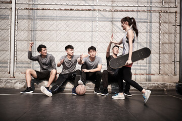 Fototapeta premium hipster young asian sport people having fun outdoors