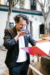 Fototapeta premium hispanic man working and call by phone in a creative office in Mexico city