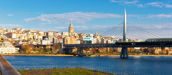 Fototapeta na wymiar Golden Horn Metro Bridge across the Golden Horn at Bosphorus strait in Istanbul, Turkey