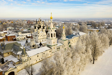 Fototapeta premium Picturesque Murom city landscape covered with snow with two main monasteries - Trinity convent and Annunciation Monastery, Russia