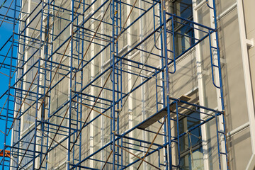 Scaffolding installed next to the building to repair the building.