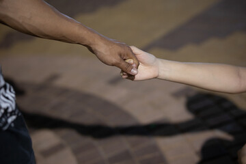 Close up view of romantic couple in love holding hands.
valentine's day. Love story and Romantic concept.