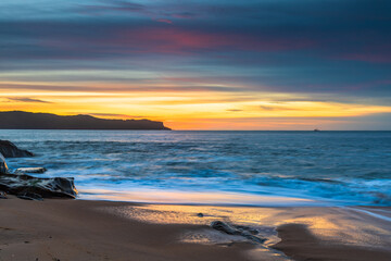 Obraz premium High Cloud Sunrise Seascape with Soft Shades of Colour