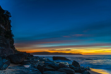 High Cloud Sunrise Seascape with Soft Shades of Colour