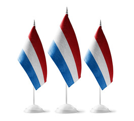 Small national flags of the Netherlands on a white background