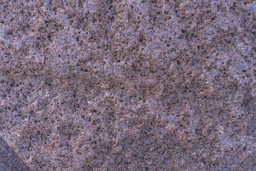 purple granite surface. stone background