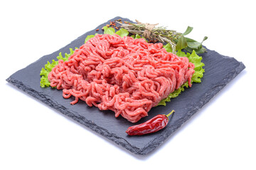Fresh minced pork and beef and spices on a slate stone.Isolated on a white background, selective...