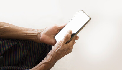 Senior people use mobile phones blank screen old mother’s wrinkled hands
