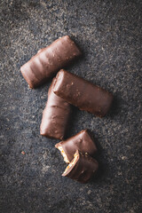 Chocolate bars with nuts filling.