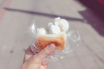 Thai coconut iced-cream in soft bread. Very popular Thai dessert in hot day.