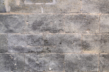 old gray background with old brick bricks