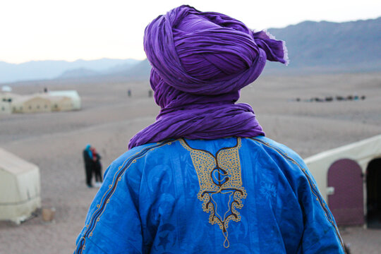 Traditional Moroccan man's costume in the desert